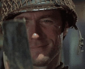 a man wearing a helmet is smiling and looking at something