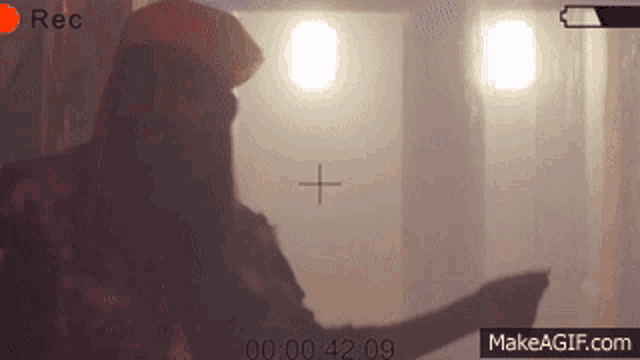 a person is being recorded with a red rec button