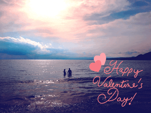 a happy valentine 's day greeting card with a couple standing in the water