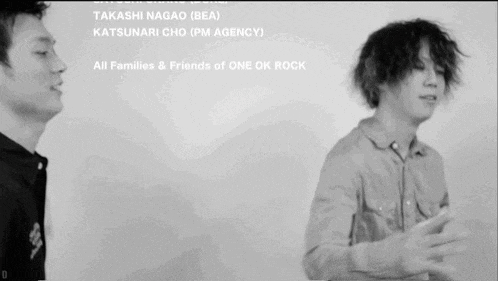 a black and white photo of two men with the words " all families & friends of one ok rock " above them