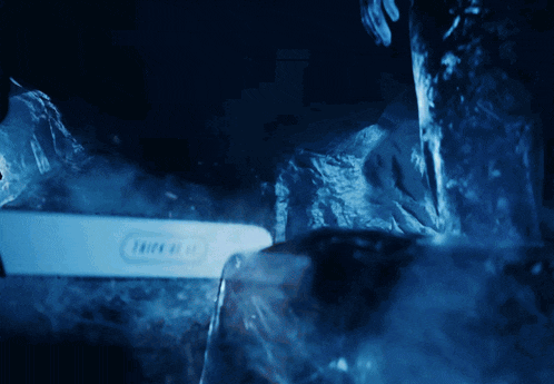 a toothbrush in a glass of water with the word oral b on it