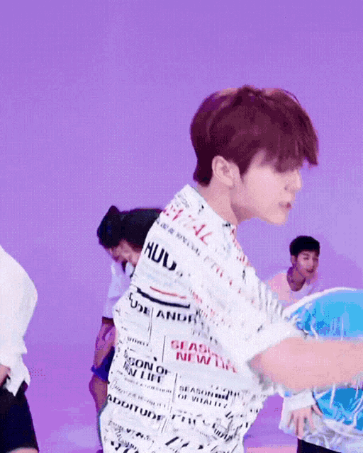 a boy wearing a shirt that says season of my life on it
