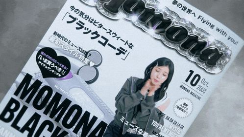 a momona magazine shows a woman on the cover