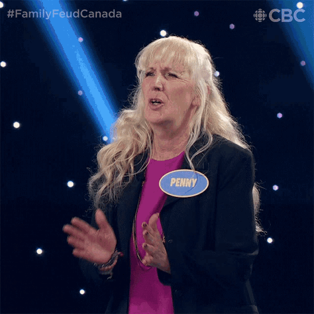 a woman with a name tag that says " penny "