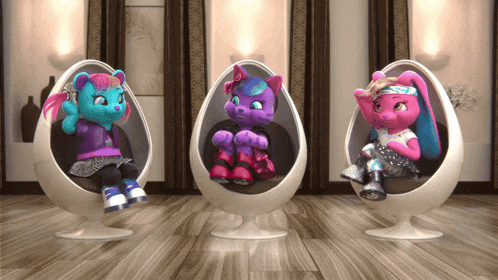 three stuffed animals are sitting in white chairs on a wood floor