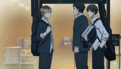 three anime characters are standing in front of a store and one has a guitar case on his back