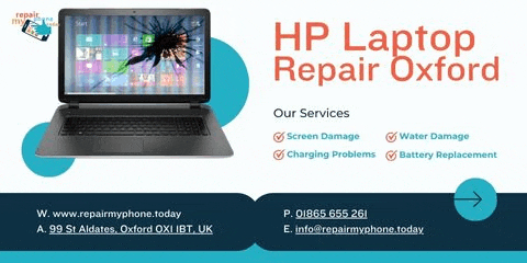 a laptop with a broken screen is sitting on top of a table .