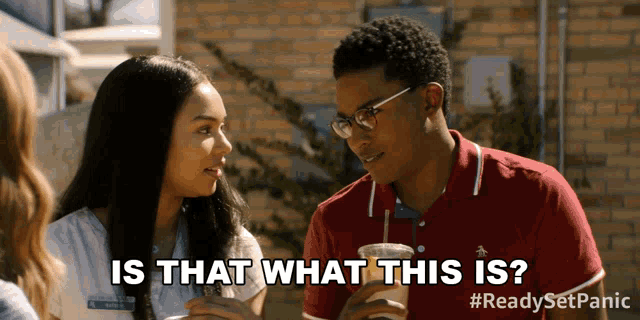a man and a woman are sitting next to each other and the man is asking the woman " is that what this is "