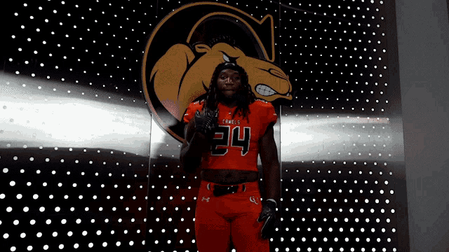a football player with the number 34 on their jersey