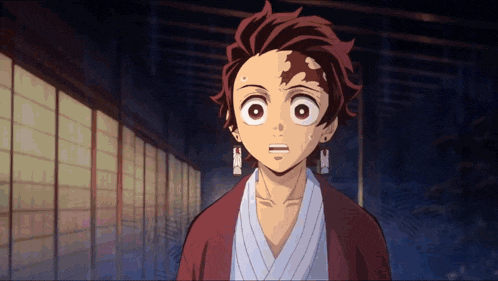 a boy with a surprised look on his face is wearing earrings
