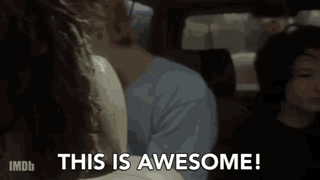a group of people in a car with the words " this is awesome "