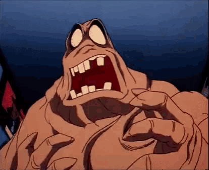 a close up of a cartoon character with his mouth open .