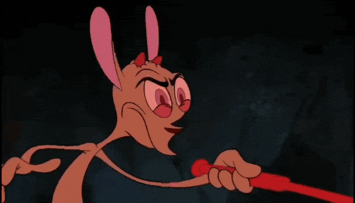 a cartoon character is holding a red object