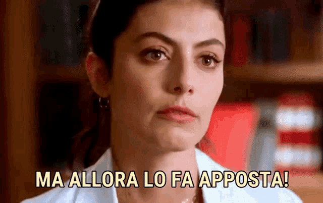 a woman in a white coat says ma allora lo fa apposta