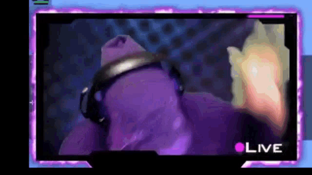 a video of a person wearing headphones with the word live on the bottom right