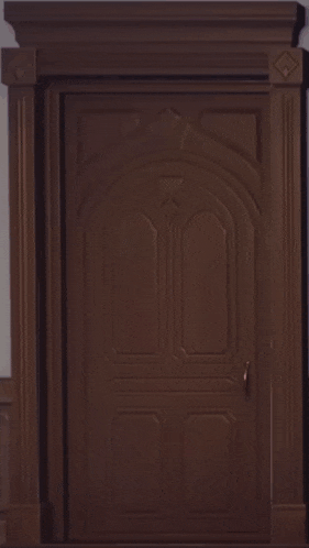 a cartoon of a girl wearing a santa hat standing in a doorway