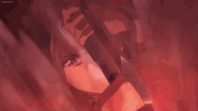 a close up of a person 's face with a red background