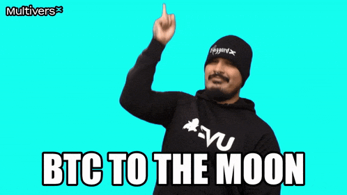 a man wearing a black beanie and a black hoodie says " btc to the moon "