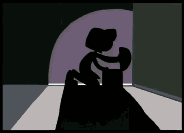 a silhouette of a person sitting on a box with a purple light behind them