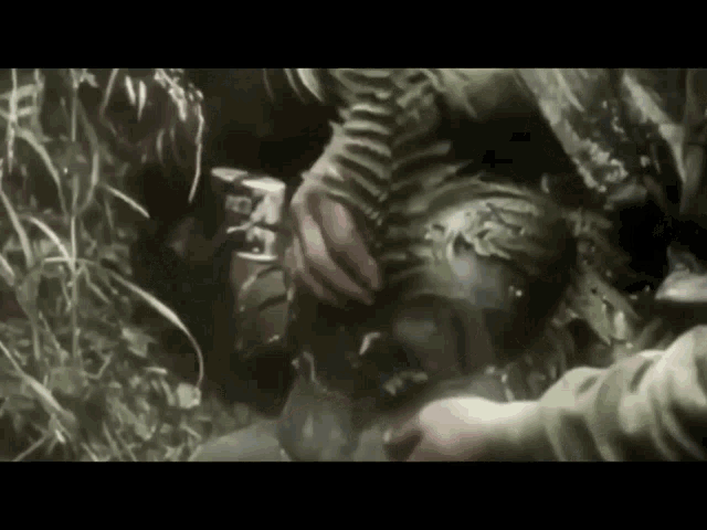 a man in a military uniform is laying on the ground