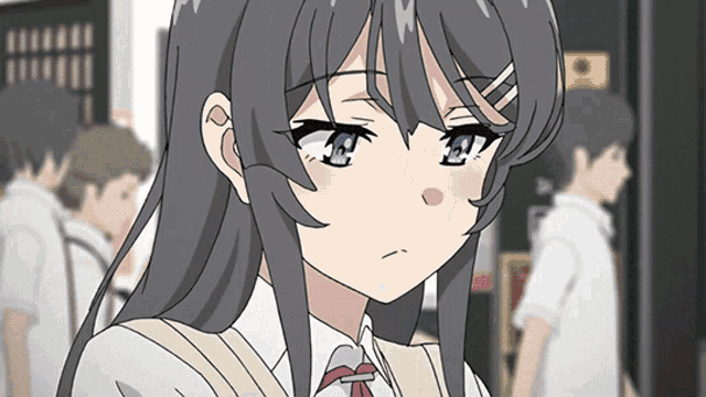 a girl with long hair and blue eyes is wearing a white shirt and red tie
