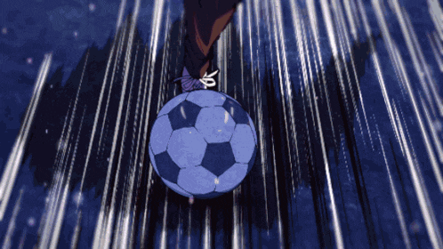 a person kicking a blue soccer ball with a butterfly on the shoe