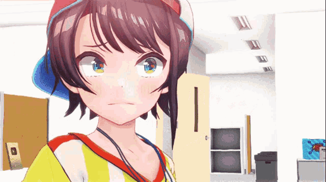 a girl with a blue hat and a yellow shirt looks angry