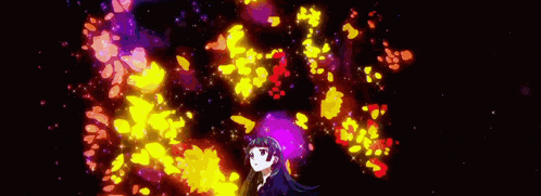 a girl in a blue dress stands in front of a firework display