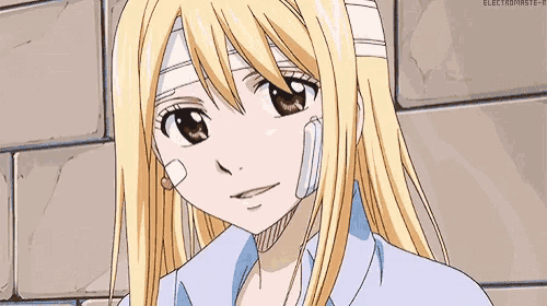 a blonde anime girl with a bandage on her head is smiling .