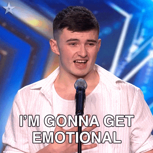 a young man singing into a microphone with the words i 'm gonna get emotional