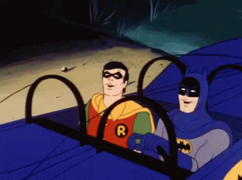 Robin Batman GIF - Robin Batman Head Bang GIFs