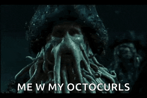 a close up of a squid with the words me w my octocurls