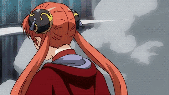 a drawing of a girl with red hair and a hoodie