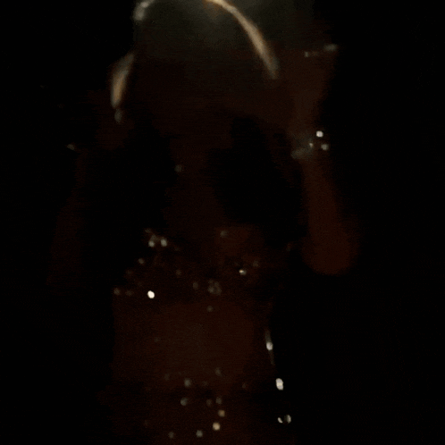 a silhouette of a person with smoke coming out of their hair .