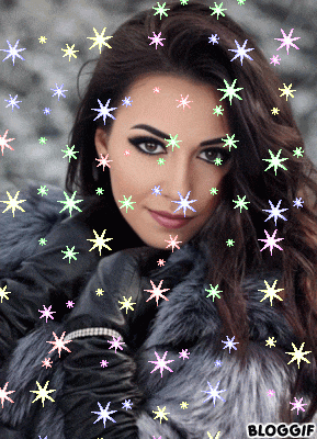 a woman in a fur coat is surrounded by glittering stars and says bloggif on the bottom