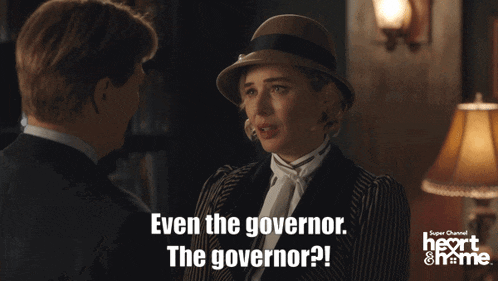 a man and a woman are looking at each other and the woman is saying even the governor the governor