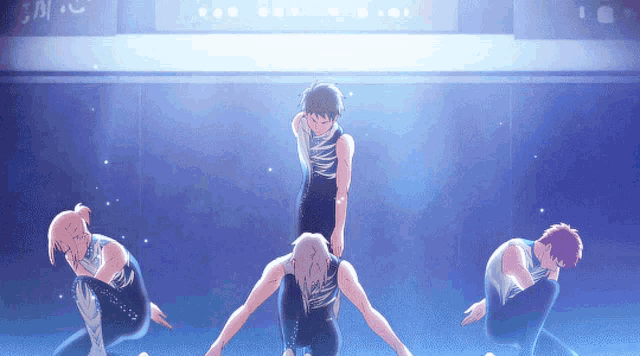 a group of gymnasts are performing on a stage with a sign that says ' jl ' in the background