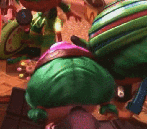 a group of cartoon characters are standing next to each other on a table with candy .
