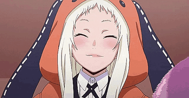 a girl with white hair is wearing an orange hoodie with ears