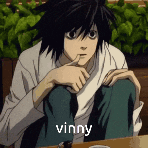 l from death note is sitting at a table with his finger in his mouth and the word vinny above him