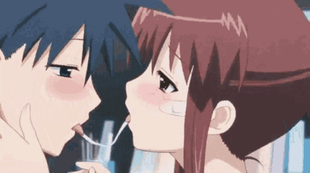 a boy and a girl are kissing in an anime