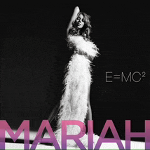 a black and white photo of a woman in a feathered dress with the name mariah on the bottom