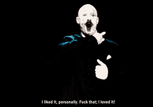 a bald man in a suit and tie says i liked it personally
