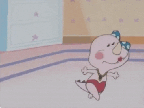 a cartoon character is laying on the floor with a blue bow on her head