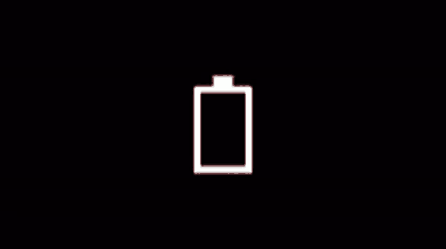 a white battery with a red stripe on the bottom is shown on a black background .