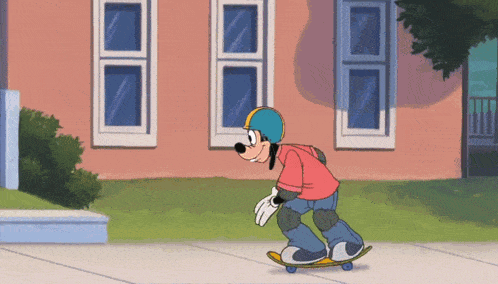 goofy wearing a helmet is riding a skateboard down a sidewalk