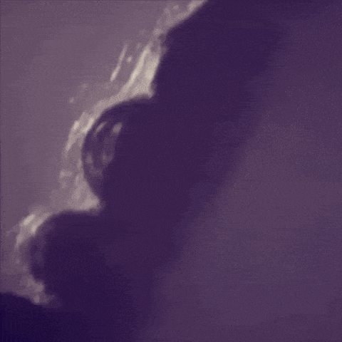 a purple background with a silhouette of a person 's head