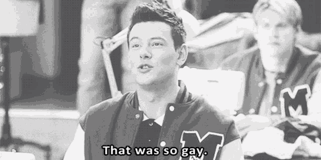 a black and white photo of a man in a varsity jacket saying `` that was so gay . ''