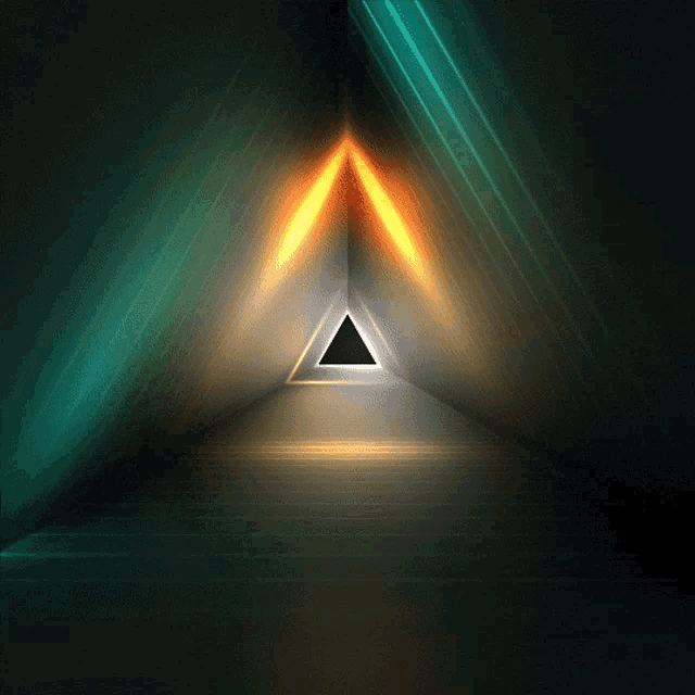 a triangle in the middle of a dark room with a light coming out of it