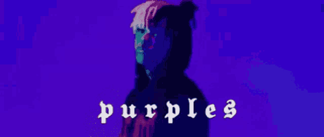 a man in a purple hoodie with the word purples on it